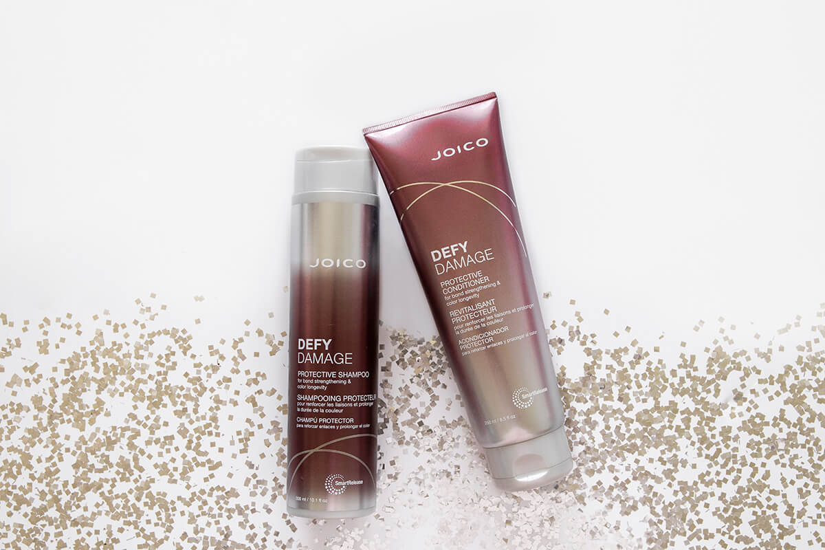Defy Damage Shampoo and Conditioner Bottles