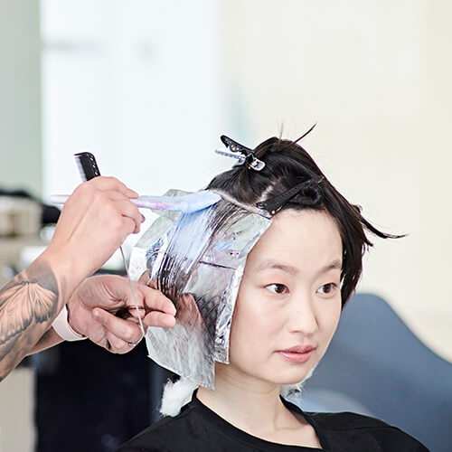stylist coloring hair