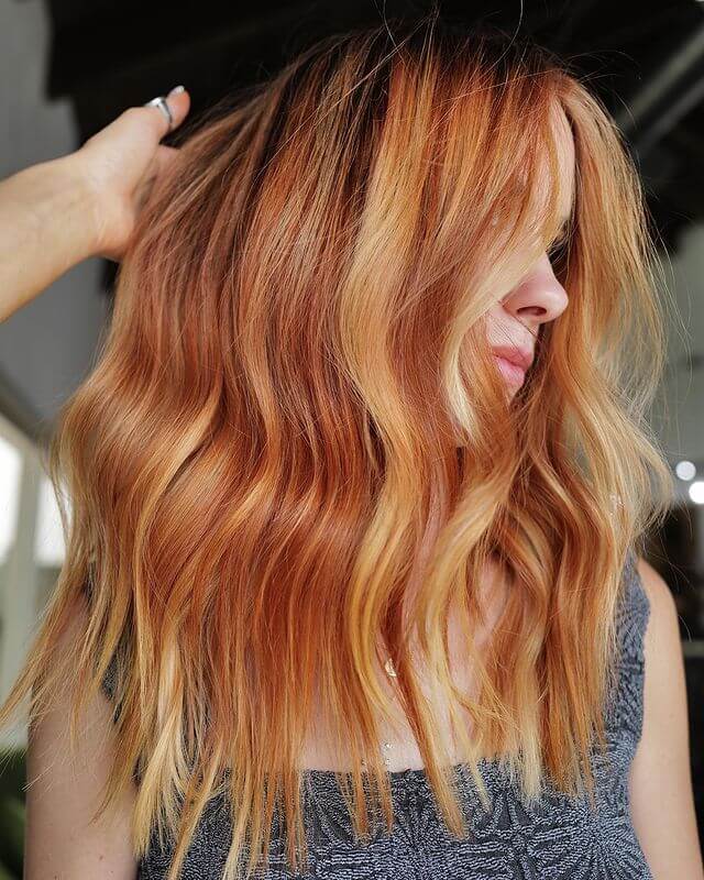 model with burnt copper hair