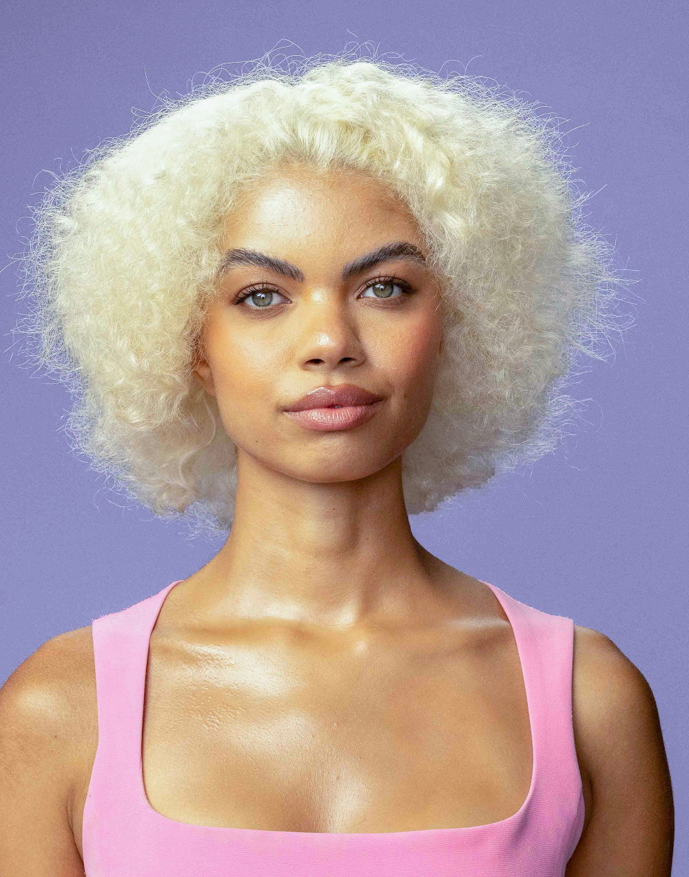 blonde curly hair model before treatment